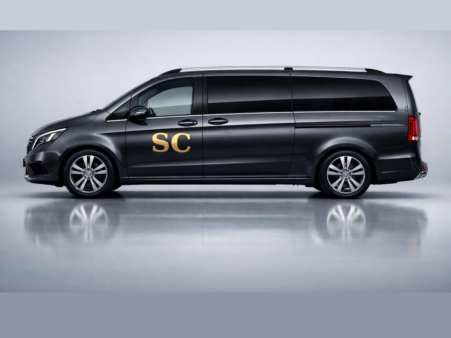 Stansted Cab MPV people carrier, side view with door livery